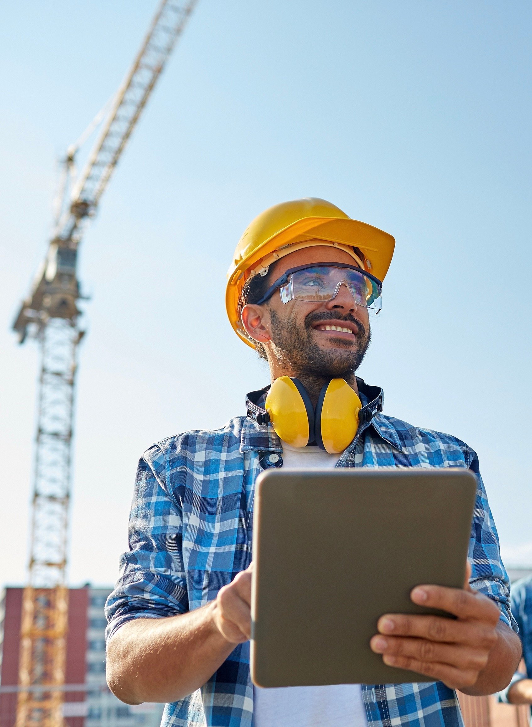 Construction worker with tablet
