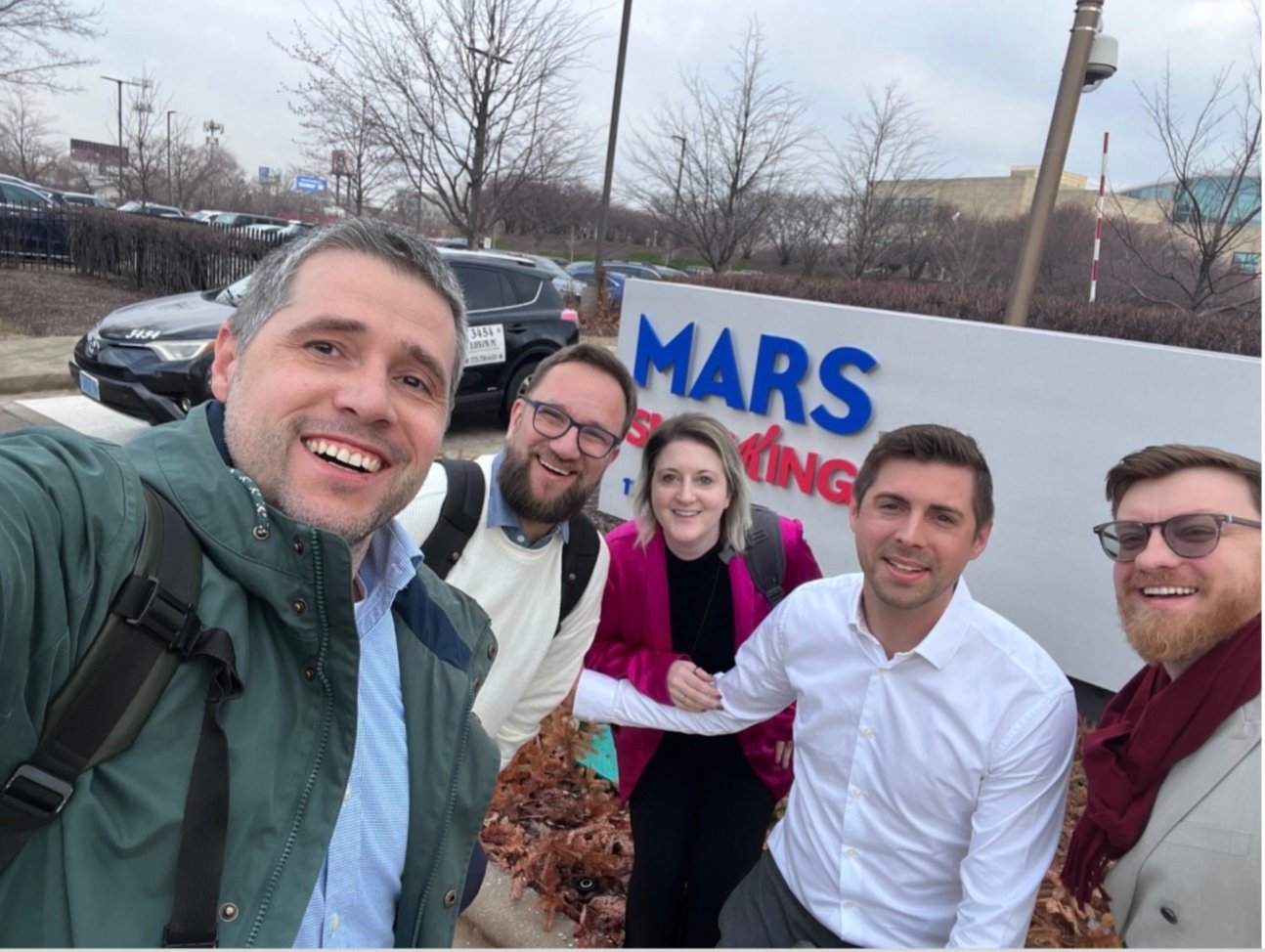 JAKALA team in front of MARS sign